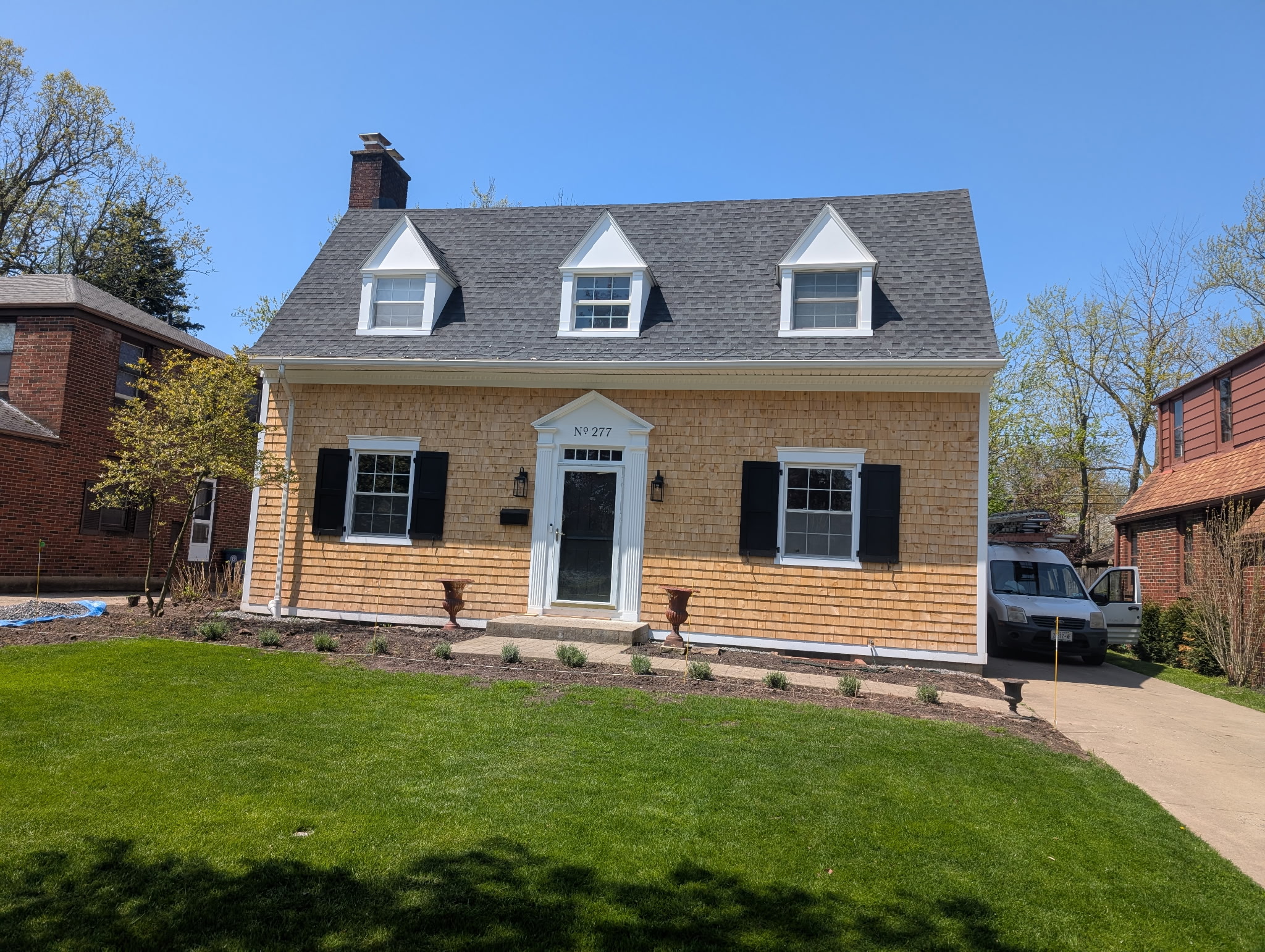 Completed residential roofing project by Top Roof WNY
