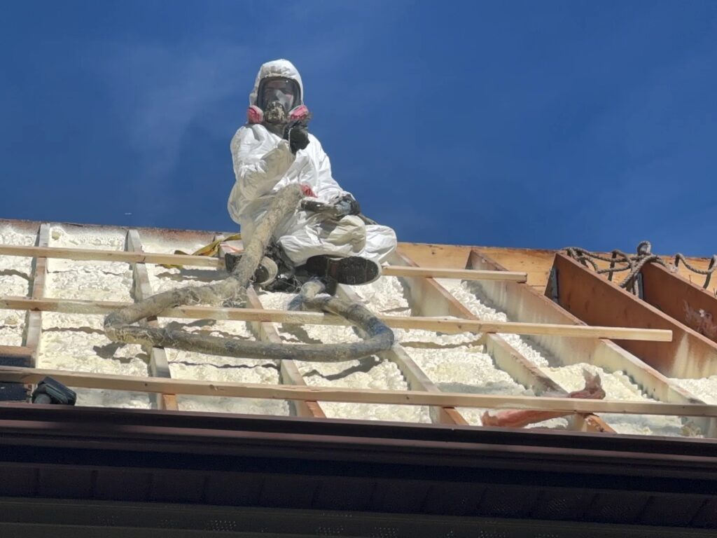Spray-foam roof insulation installation in Attica, NY.